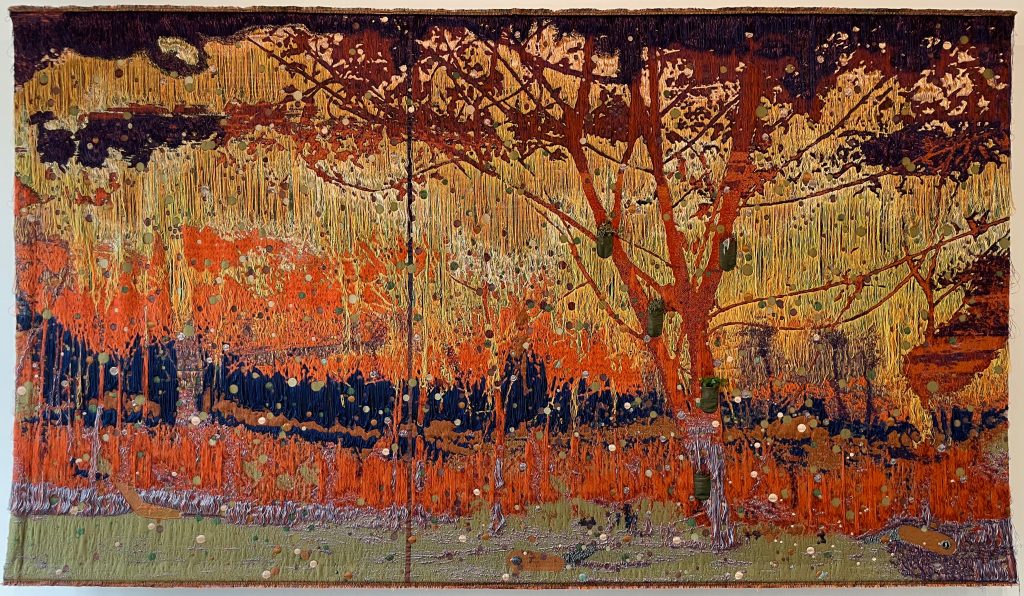 Abstract forest scene in yellows, oranges and reds